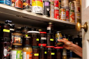 An overpacked cupboard makes it hard to keep track of your foods