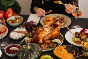 A roasted turkey dinner on a festive table