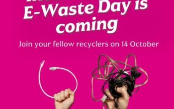 Text reads "International E-Waste day is coming. Join your fellow recyclers on October 14th. Recycle your electricals." an image below depicts two outstretched hands each holding bundles of electrical cables, device chargers and other electrical wires.